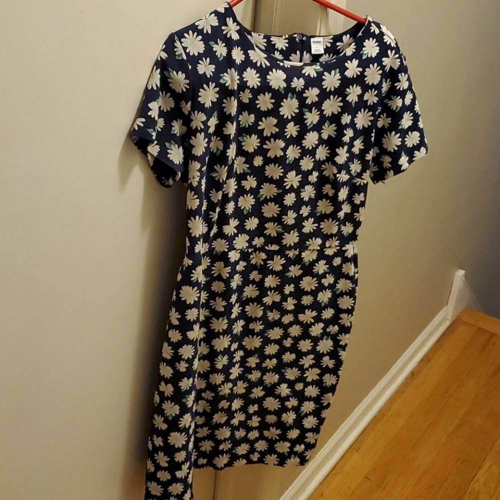 Floral form fitting dress navy blue background